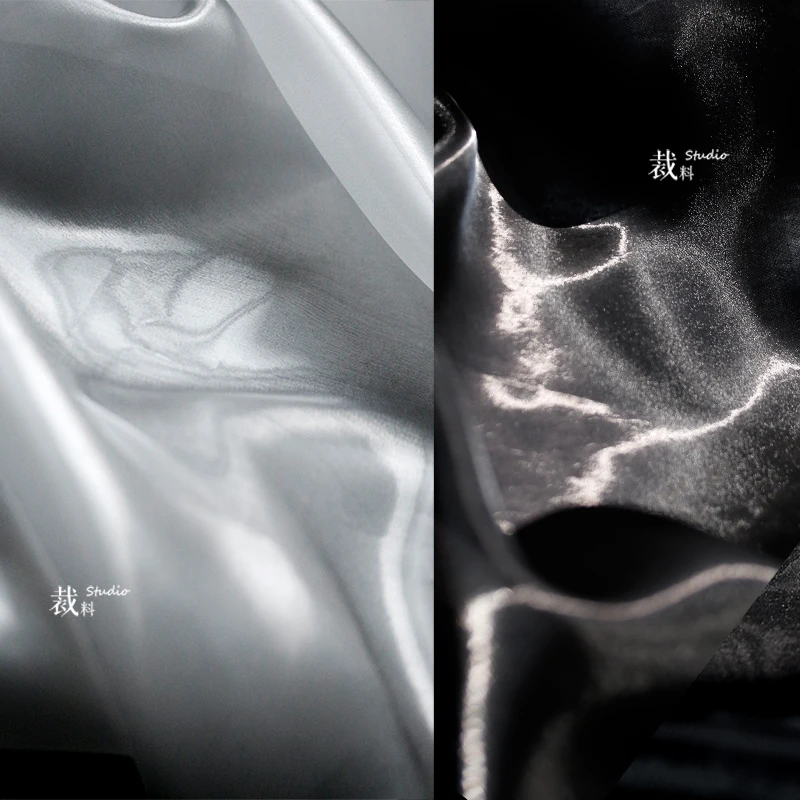 Bellissimo filato d'acqua gelatinoso, luce super brillante, leggermente trasparente, tessuto di design con silhouette crittografata in bianco e nero