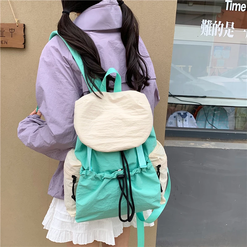 

Lightweight Korean Style Color Block Nylon Backpack Drawstring Rucksack Multi-pocket Bags Travel Hiking Work Youth School Bags