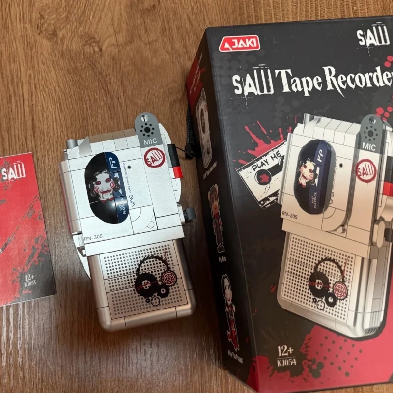 Genuine JAKI Chainsaw Massacre Series Building Blocks Billy The Puppet Pig Mask Assembly Model Salll Tape Recorder Display Gift