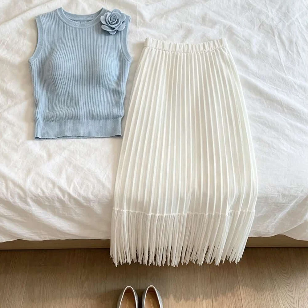 French holiday style sleeveless knitted sweater pleated skirt two-piece set women's summer high-end sense beautiful set 2026 new