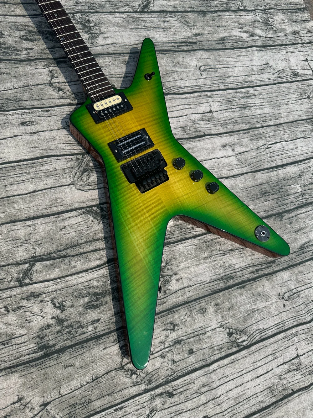 

Irregular electric guitar, black double shake, imported wood and paint, green tiger pattern, bright light, in stock, fast shippi