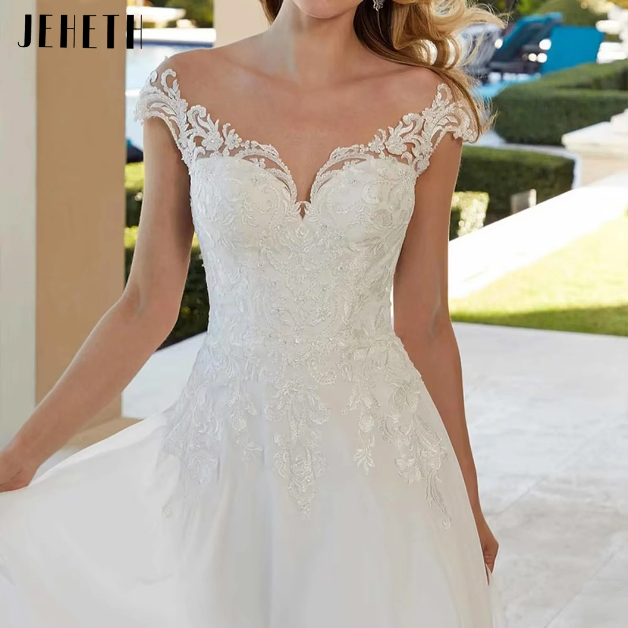 JEHETH Eleganckie suknie ślubne z dekoltem w szpic Suknie ślubne z krótkim rękawem A-Line Bride Robes Applique Luxury New Robe De Mariée Customized JEHETH Eleganckie sukienki ślubne z szyjką w V Rękawie na czapkę Sukie