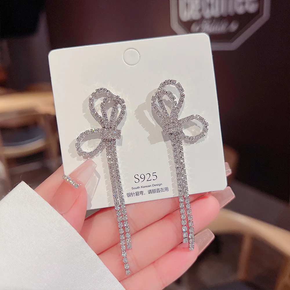 Bow Tassel Earrings New Wave High-grade Sense Niche Full Diamond Super Fairy Temperament Earrings.