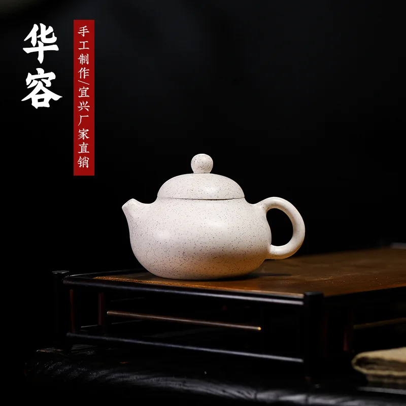 

Huarong Zisha Pot Handmade Sesame White Jade Segment Mud Teapot Yuzhong Sand Manufacturer Wholesale One Tea Set