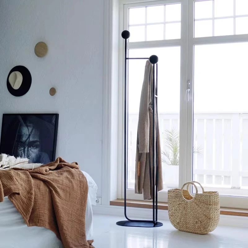 

Metal floor hanger design creative decorative hanger modern simple living room bedroom bed and breakfast coat rack