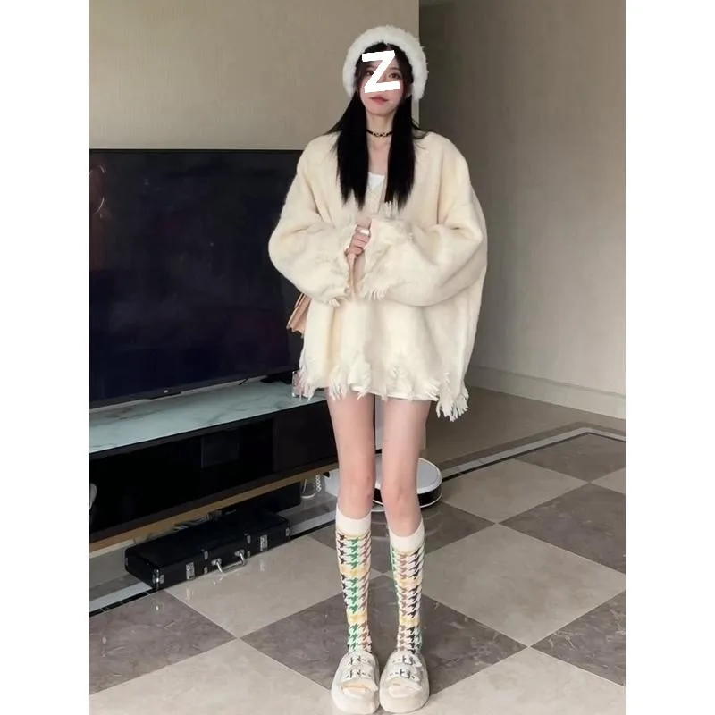 

Women's Spring and Autumn Lazy Wind Korean Version Loose and Thin Knitted Sweater New French Retro V-neck Fringed Design Sweater