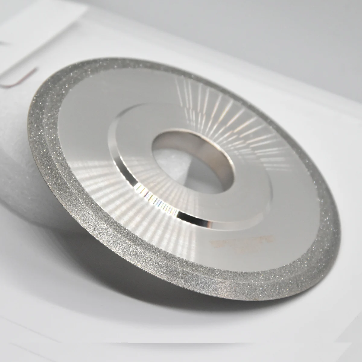 Ultra-thin diamond cutting grinding wheel with 45°/60°/90° multi-angle grit options. Features a metal flange for explosion-proof