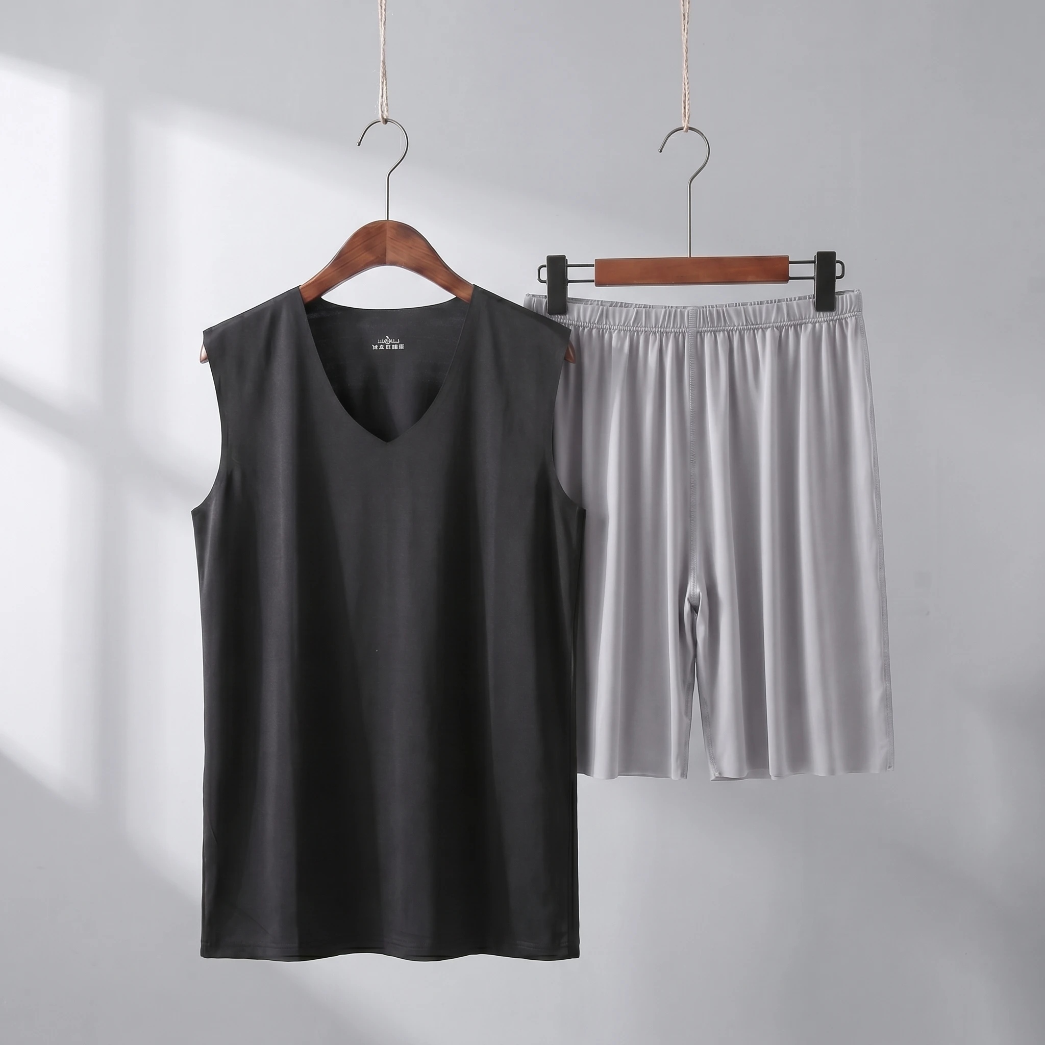 Black vest + gray shorts
