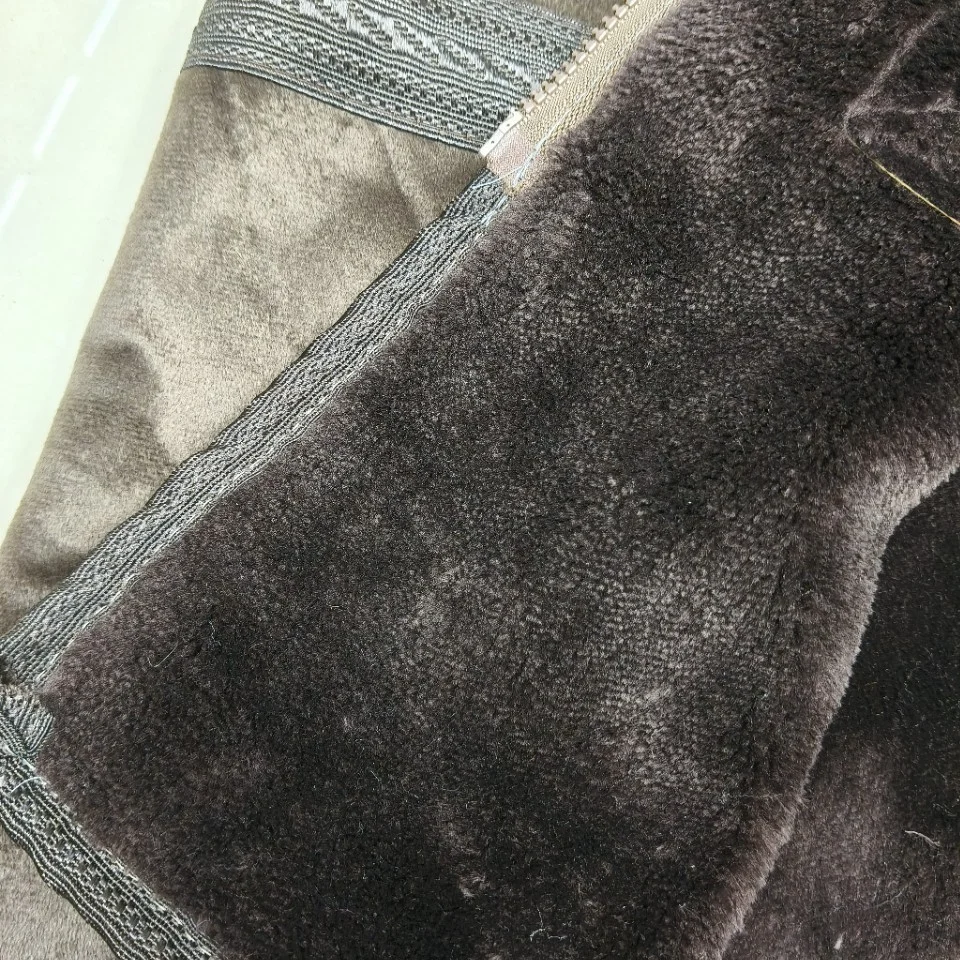 الجملة 2026 Cuntom OEM الشتاء سميكة وممتدة الجلد المدبوغ الرجال رداء سترة دافئة مقنعين جيب الشتاء رداء