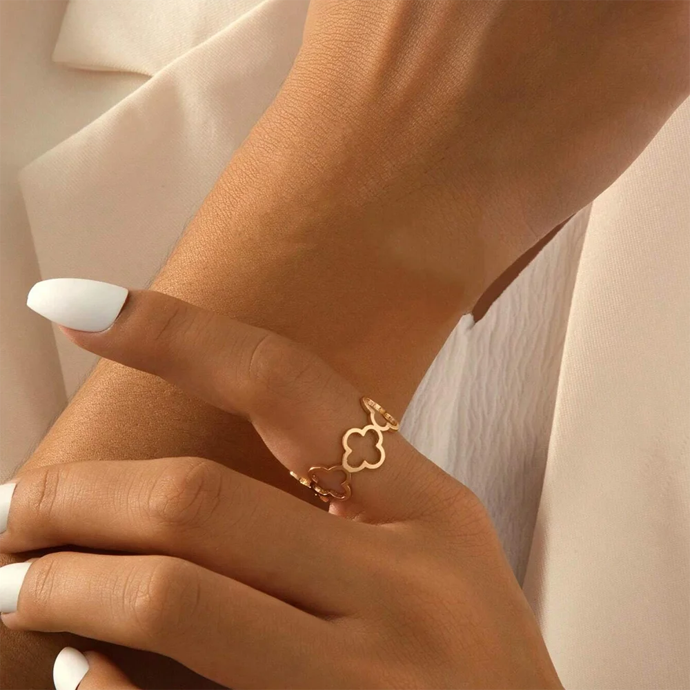 DOTIF Stainless Steel Lucky Hollow Four-Leaf Clover Ring Female Fashion Simple Opening Adjustable Finger Jewelry Party Gifts