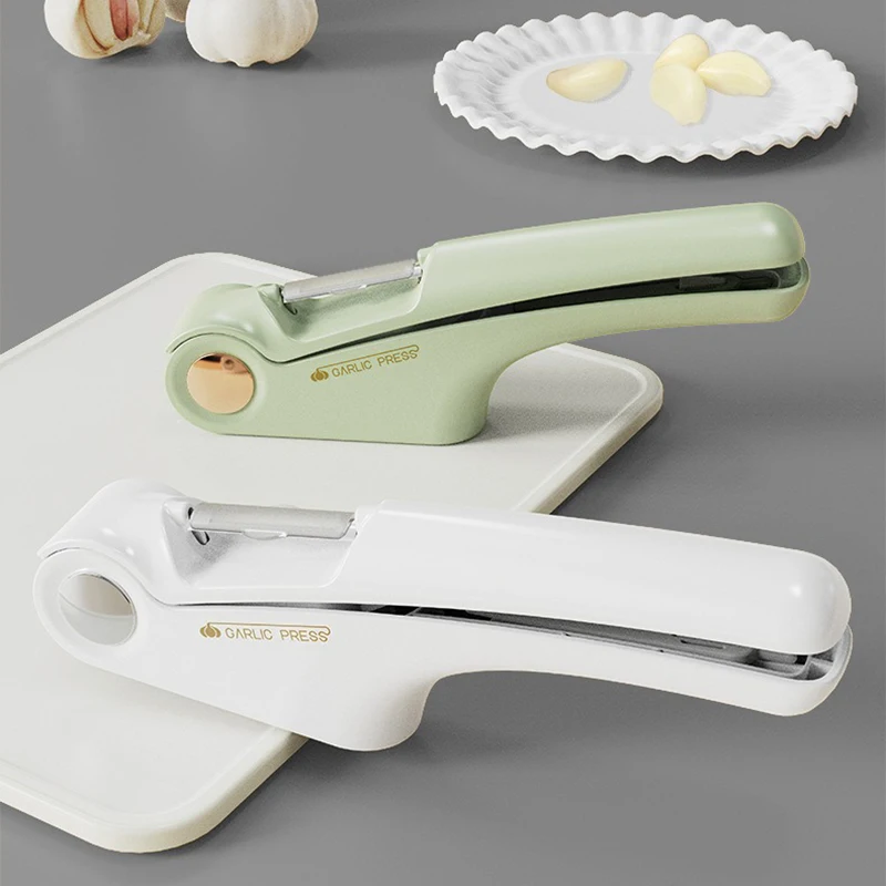 

4-in-1 multi-functional stainless steel garlic crusher for kitchen and dining room use, peeler, mashing machine, handheld tool,