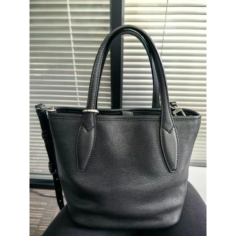 

Cowhide long vegetable basket bag, portable crossbody bag, large capacity, high-grade feeling, authentic leather bucket bag.