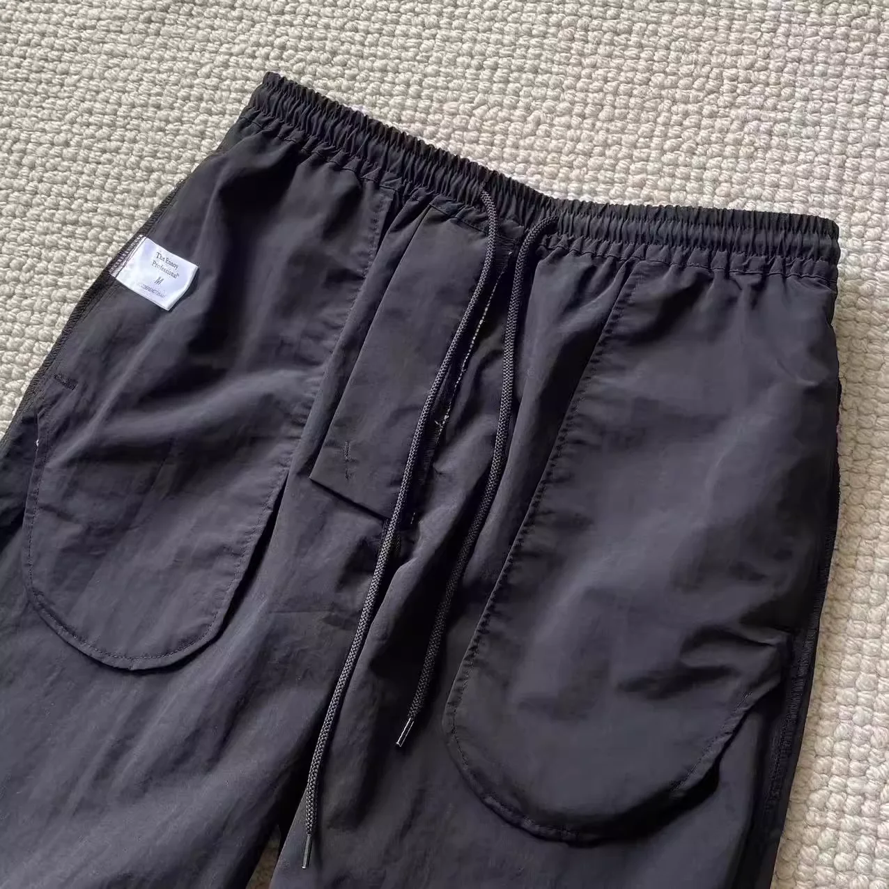 The Ennoy Professiona nylon quick-drying pants with cuffs, sports pants, loose casual pants