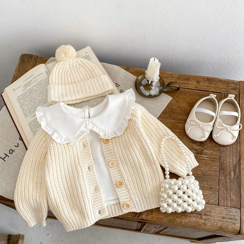 

2025 New autumn baby clothing, 0-3 year old girls and children's beige knitted long sleeved jacket, cardigan sweater