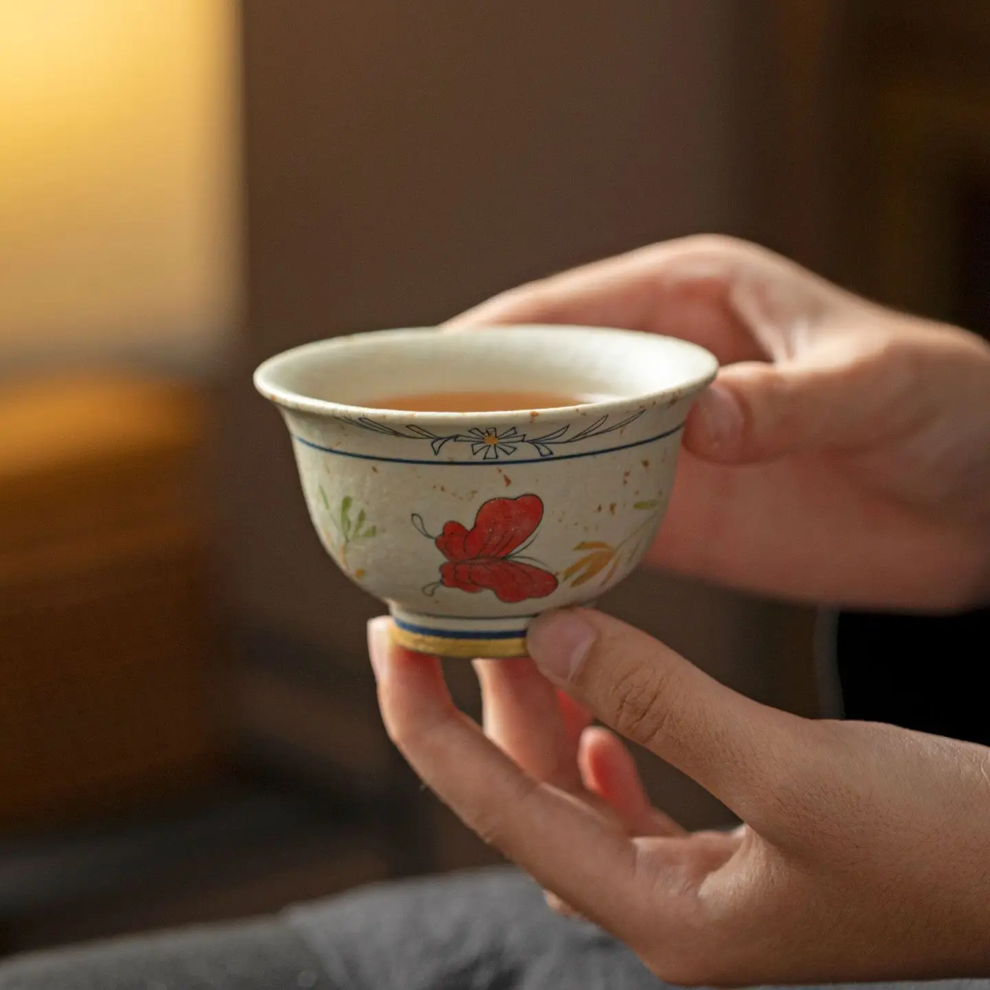Blue and White Firestone Red Caramel Glaze Hand Painted Orchid Pressure Bottle Porcelain Cup Household Tea Kung Fu Set