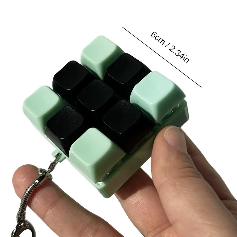 ‌ تململ المفاتيح لعبة 9 مفاتيح لوحة المفاتيح زر الإجهاد الإغاثة قلادة مكافحة القلق فنجر الصحافة قبعات للبالغين والأطفال