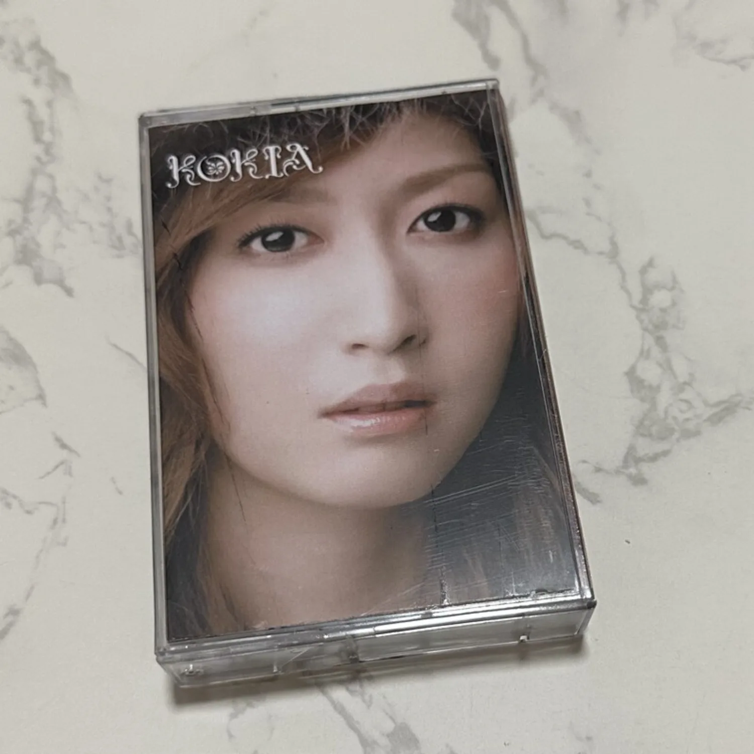 

Редкая запечатанная аудиокассета KOKIA New Age Folk J-Pop: исцеляющий вокал, ретро-аналоговый звук, коллекционный предмет для фанатов, домашний декор
