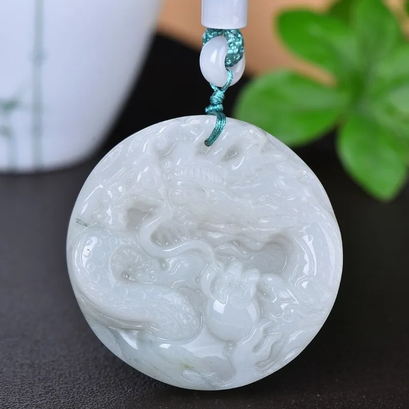 

Tianshan Cui Auspicious Dragon Pendant Is Beautifully Carved.