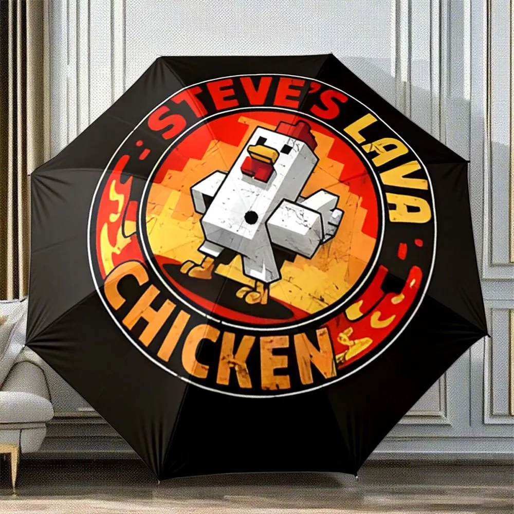 

Portable folding umbrella The umbrella features a bold black background with a fiery red and orange circular design, showcasin