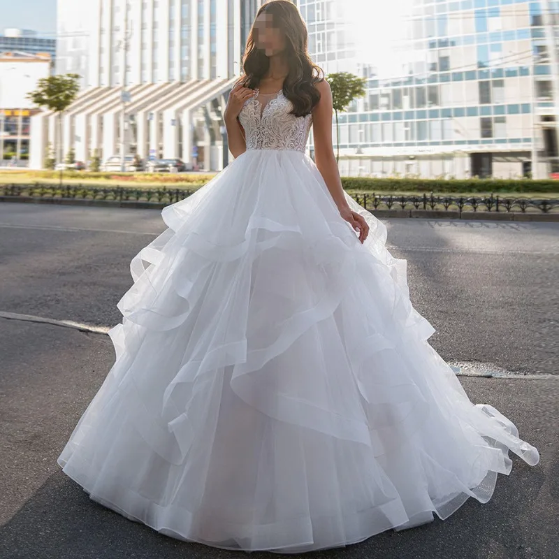 

Princess Ball Gown Wedding Dress with Sleeveless Lace Applique Bridal Gown Backless Skirt with Ruffles Vestido De Noiva