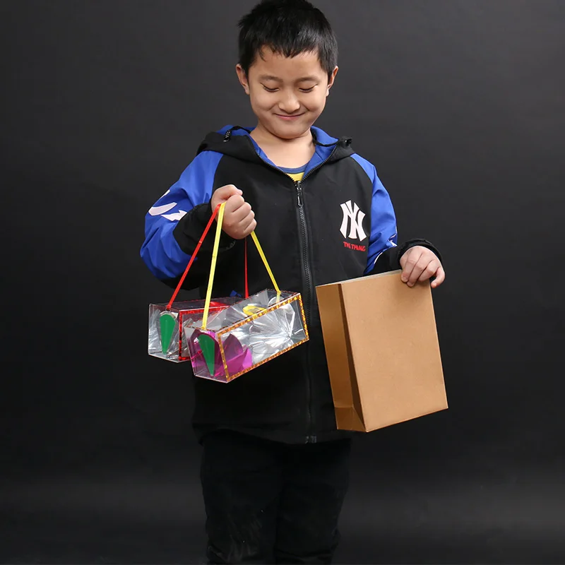 Boîte à fleurs en papier - sac vide qui libère les fleurs - boîte à fleurs qui se transforme en boîte à fleurs - spectacle pour enfants