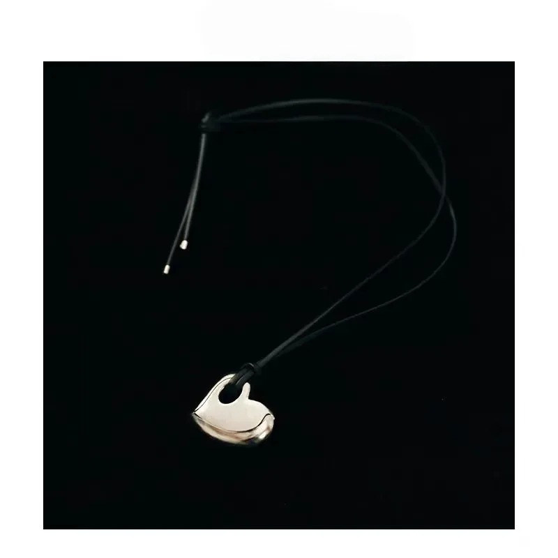 24-Year-old new French black rope love pendant, high-end sense light luxury adjustable long hollow love pendant necklace