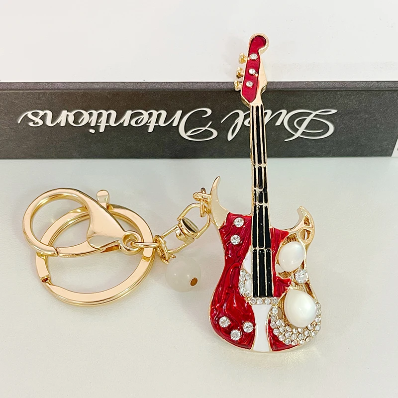 

2024 New Meet the Music Crystal Guitar Keychain Opal Inlay Band Punk Rock Style Women Handbag Pendant Car Key Ring
