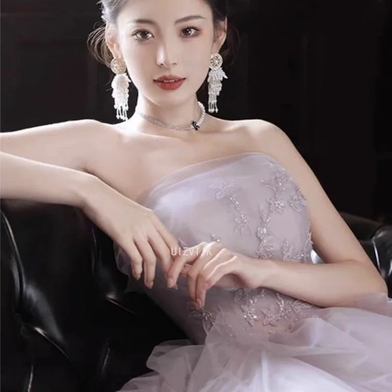 فساتين زفاف فاخرة خفيفة للعروس 2025 فساتين نسائية أنيقة ومثيرة بدون حمالات لالتقاط الصور أرجواني للحفلات الراقصة المسائية