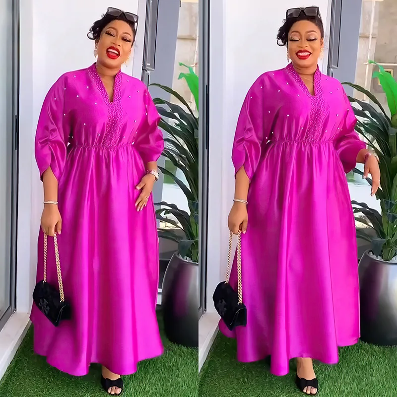 Elegancka sukienka damska do pracy, z wysokim stanem, zdobiona koralikami, w jednolitym kolorze, z satynowym kołnierzykiem.