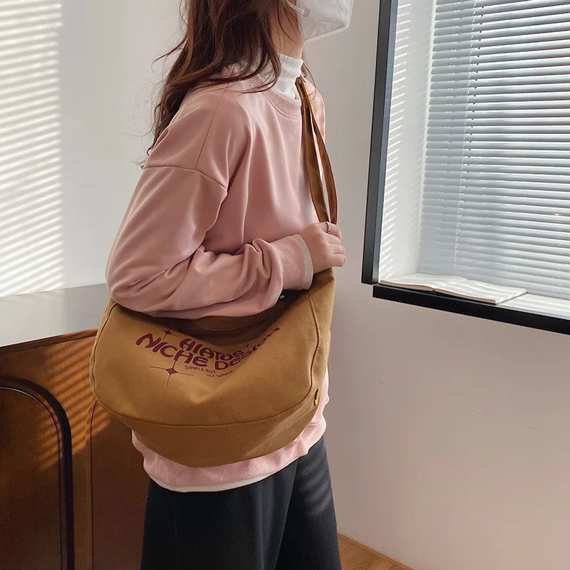 Borsa in tela di grande capacità bianca Beige per donna borsa per gnocchi versione stampa lettera per borsa a tracolla coreana femminile a buon