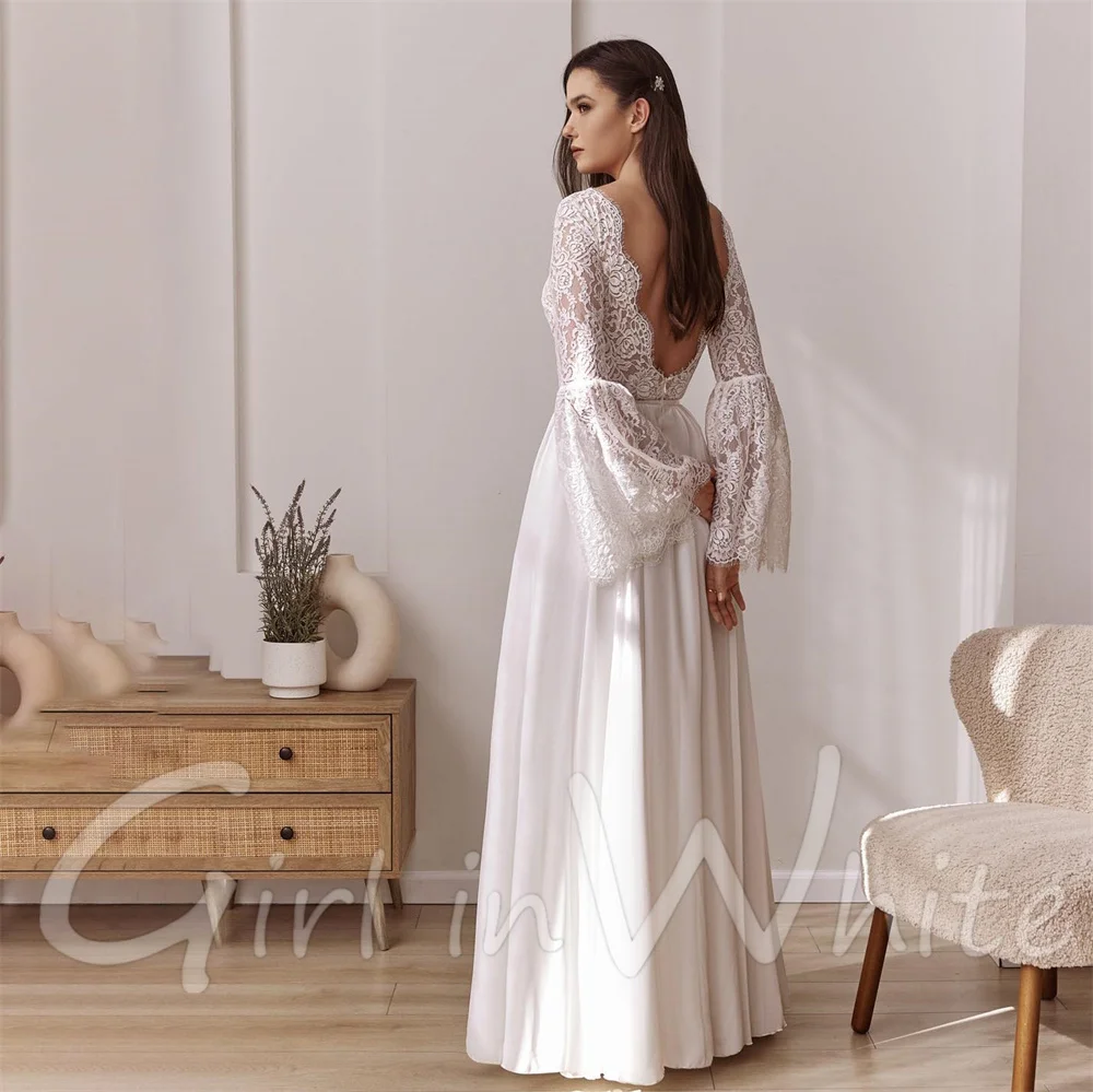 Una linea di pizzo Boho abiti da sposa personalizzati manica lunga svasata sexy scollo a V profondo abiti da sposa abiti da sposa abiti da sposa