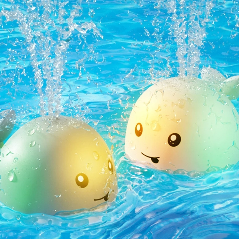 sensing-baby-bath-whale-toy-automatic-water-random-shade-abs-15ub
