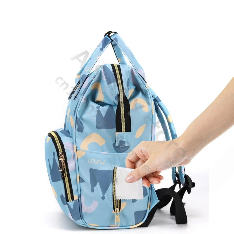 Mommy bag/new multifunctional and fashionable mother and baby bag/for moms to go out/portable mommy bag/walking baby backpack