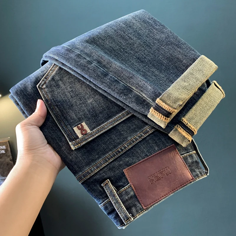 Men's jeans 2025 autumn new fashion high-end trend embroidered print loose tapered elastic pants men