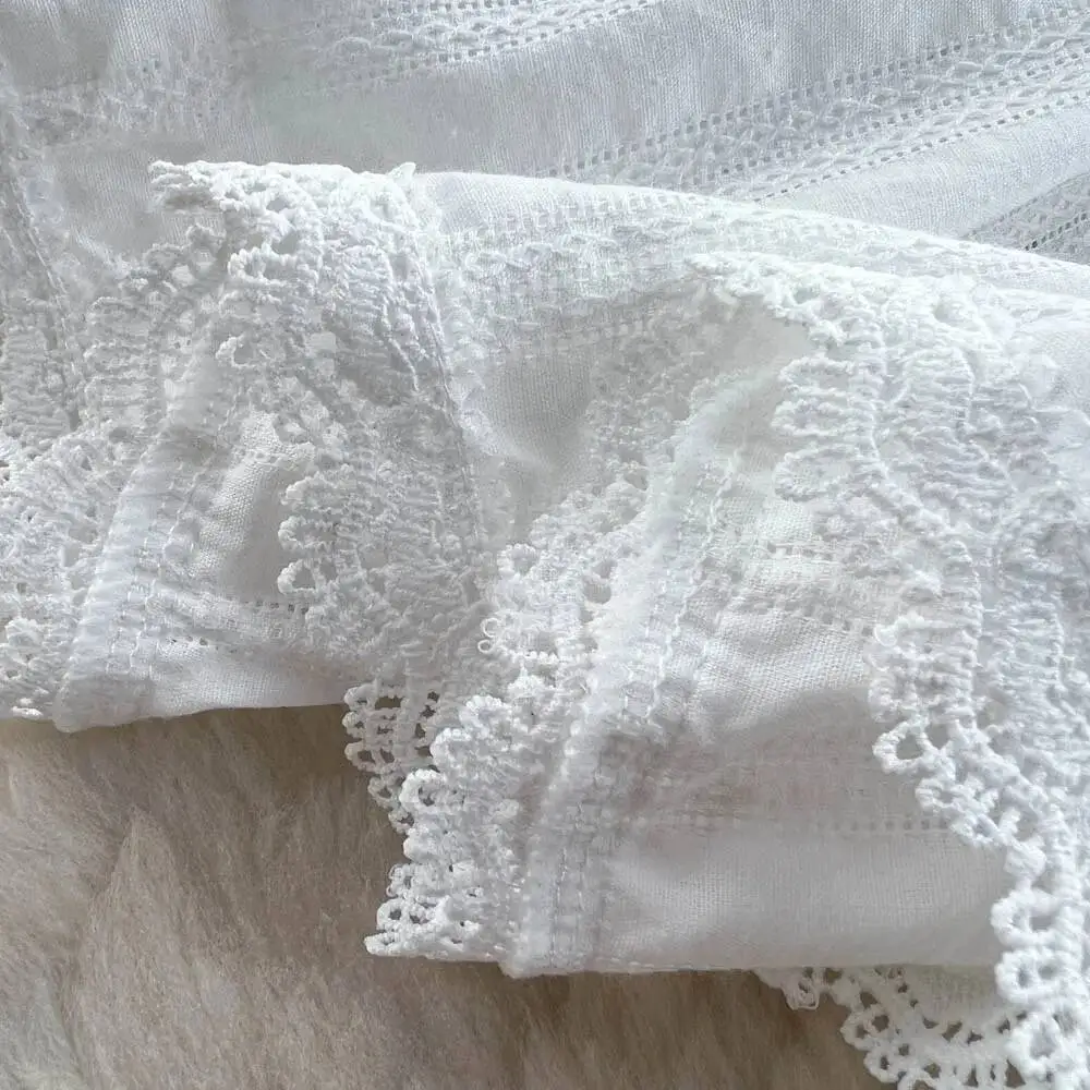 Abito da spiaggia bianco elegante da donna Primavera Autunno Abiti corti a vita alta vuoti in pizzo Abiti vintage Boho a maniche lunghe