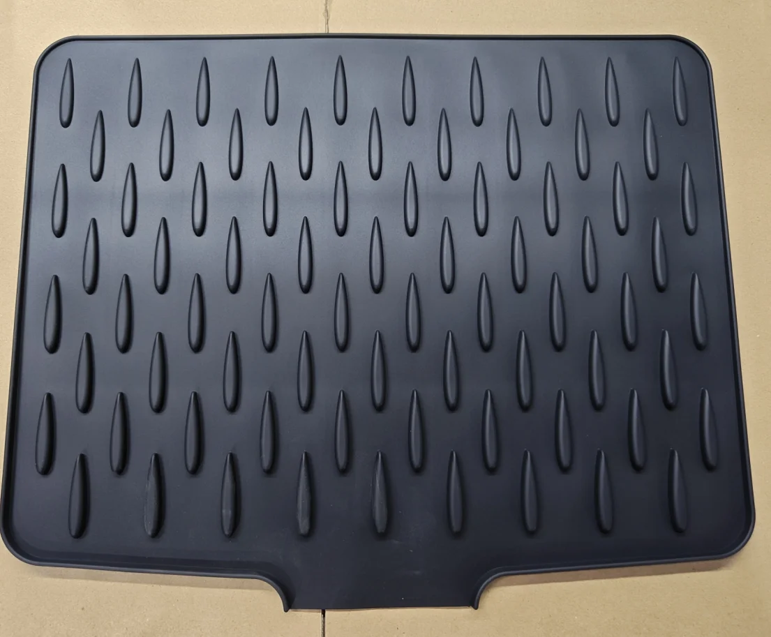

2025 Multi-Functional Foldable Silicone Drainage Mat Non-Slip Anti-Scald Coaster for Kitchen Tableware Utensils Silicone Mat