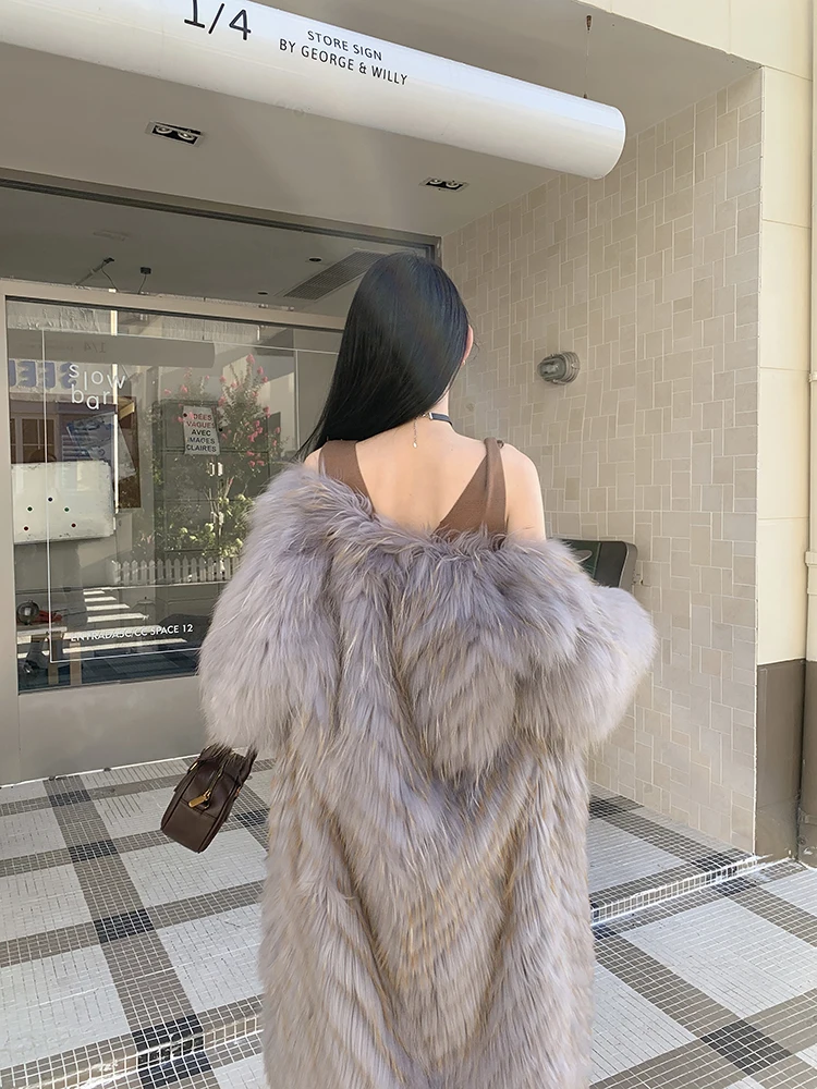 패션 디자인을 갖춘 새로운 세련되고 넉넉한 긴 너구리 개 모피 여성 모피 겉옷