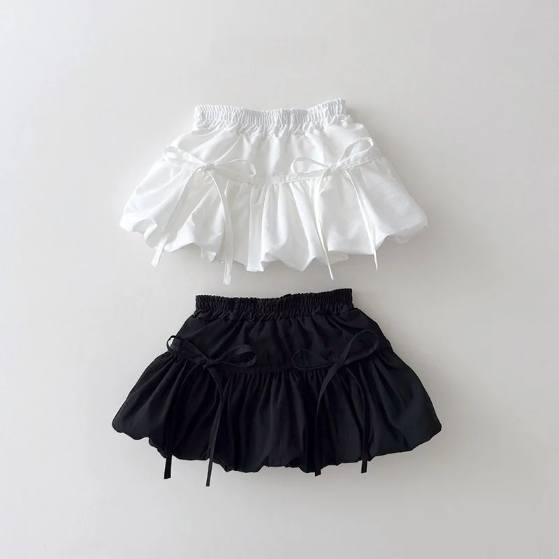 

2026 Summer New Baby Girl Cute Bow Short Skirt Solid Sweet Princess Skirt Cotton Girls Flower Bud Skirt Kids Mini Skirts