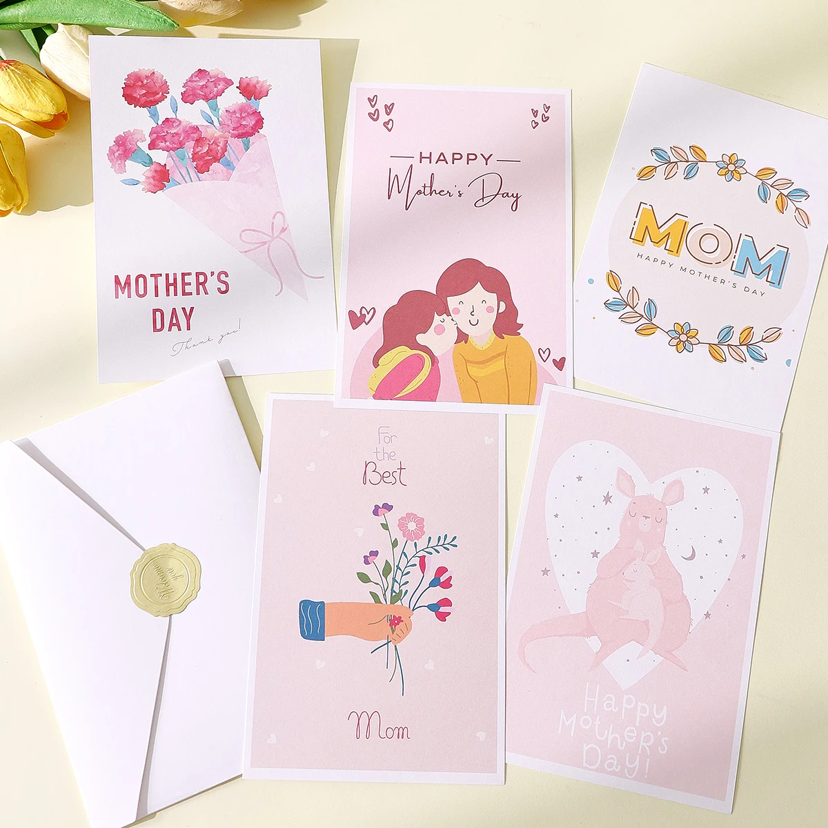 

A Mother's Day Greeting Card with an Accompanying Envelope. The Card Is Blank and Features a Cartoon Floral Design, Suitable for Mother's Day Celebrations, as a Thank You Card, or as a Mother's Day Gift for Mom.