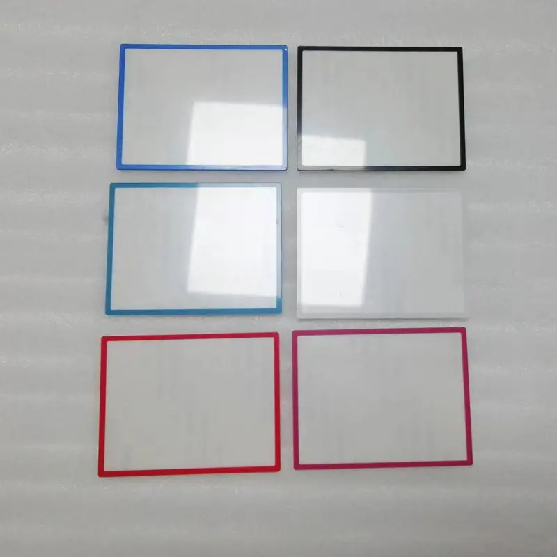 พื้นผิวที่มีสีสันกระจกพลาสติกเลนส์ป้องกันเลนส์หน้าจอสติกเกอร์สำหรับ NintendDSi คอนโซล