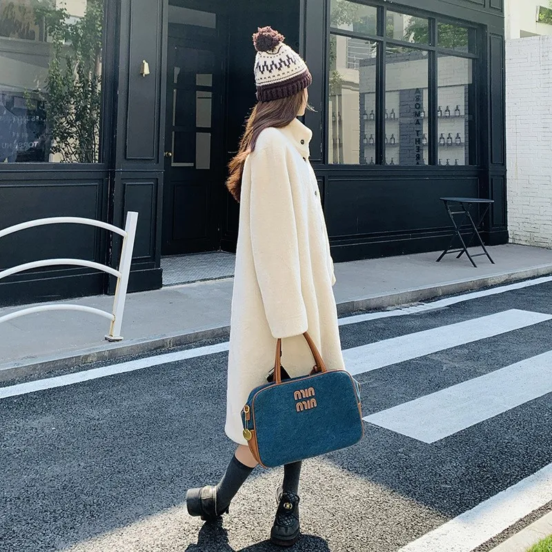 A new youthful versatile comfortable and skin-friendly casual long trench coat