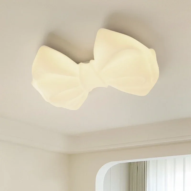 

Cream wind bedroom chandelier Modern simple atmosphere restaurant light Creative warm designer bow bar light