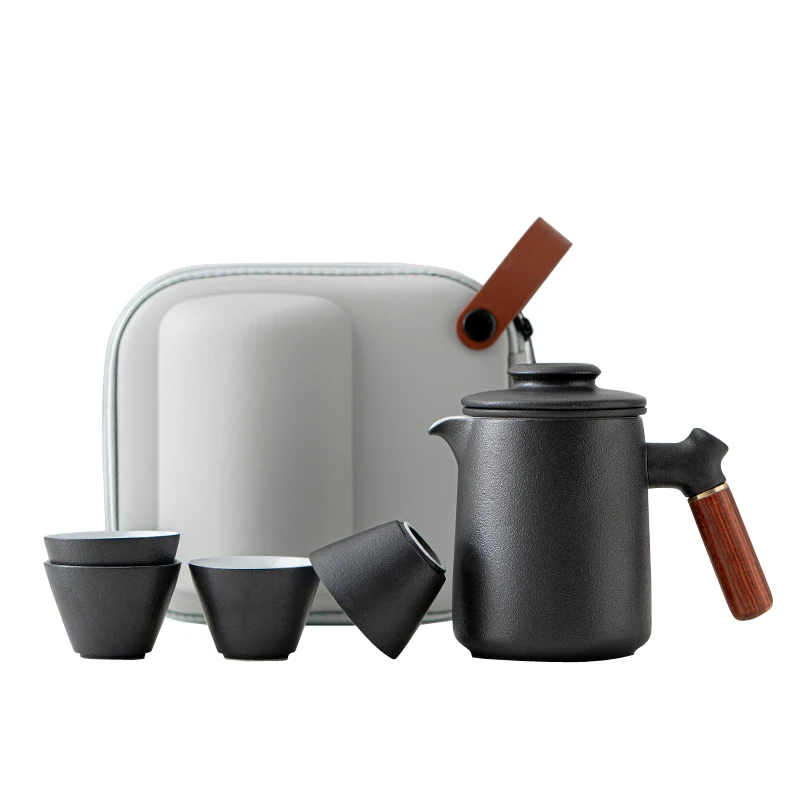 

High-end portable travel ceramic tea set, one pot and four cups gift set.