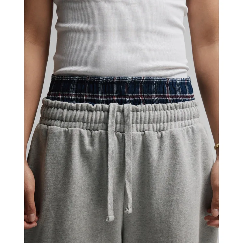 2025 Outono/Inverno Novo Europeu e Americano Harajuku Street cor sólida moda quente design de cintura dupla falsa calças de duas peças