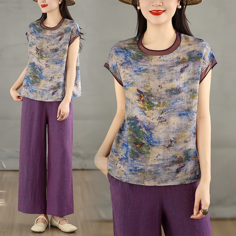 

Комплект: Свободная женская футболка и брюки палаццо с коротким рукавом. Модный повседневный образ для весны и лета в стиле Lazy Style. Художественный дизайн.