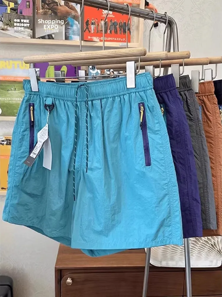 

Qui Dry Outdoor orts Мужчины Женщины Летние тонкие цветные блузки на молнии Свободные пять деталей Альпинизм Спортивная рабочая одежда Брюки