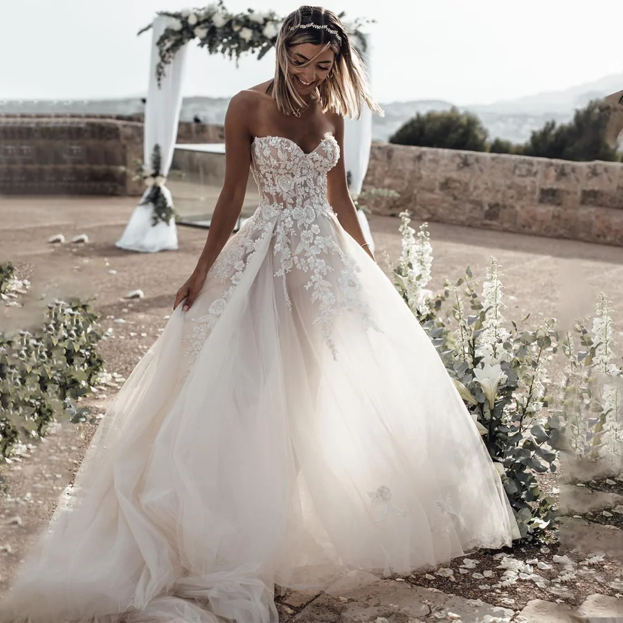 Customized Breathtaking Strapless Wedding Dress Featuring Stunning Crystals Lace Appliques and Flowy  Silhouette Bridal Dress