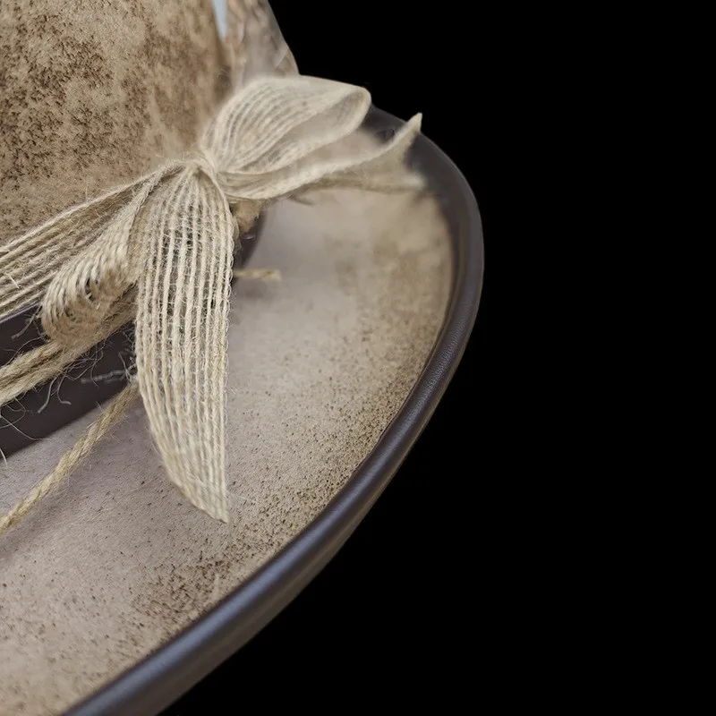 A cotton and linen rope decorated top hat felt