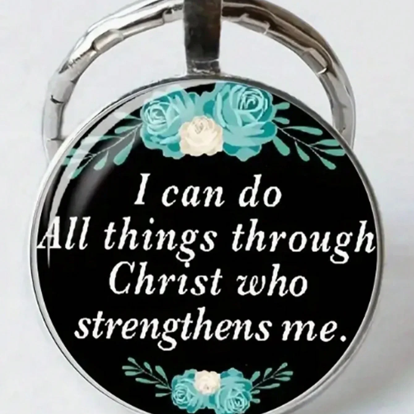 A Keychain With A Gemstone And A Biblical Quote, 