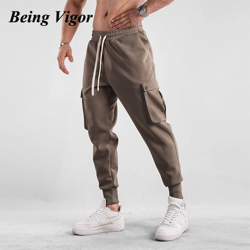 

Being Vigor Cotton Sweat Pants Leisure Joggers Button Pocketed Cargo Pants Elastic Waisted Sport Pants Long Trousers pantalone